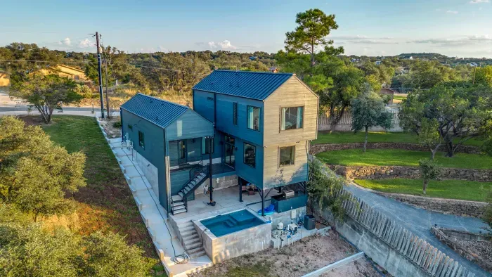 Aerial view of the property showcasing lakefront living.