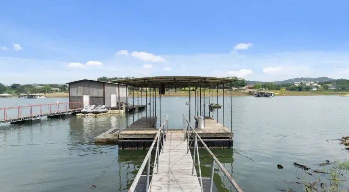 Covered dock on the lake perfect for boating and fishing.