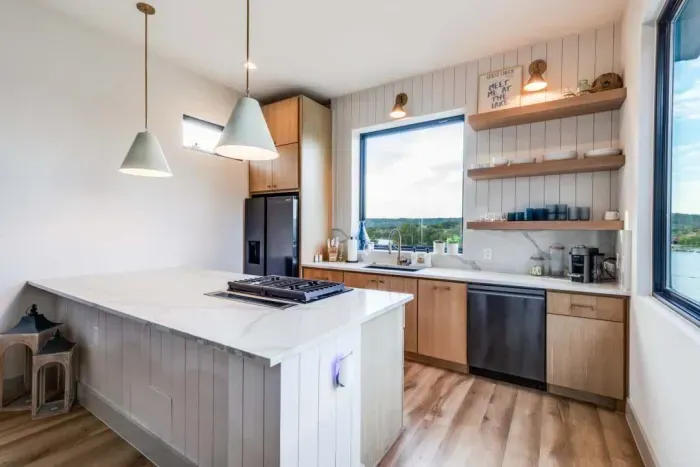 Modern kitchen with sleek design and plenty of natural light.