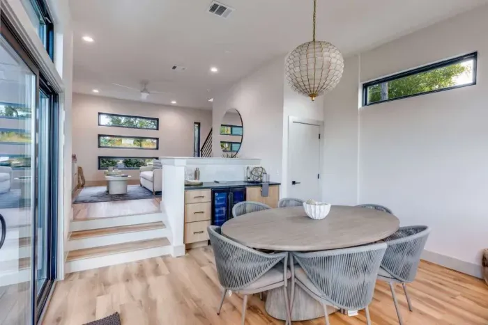 Dining area with stylish lighting and open layout.