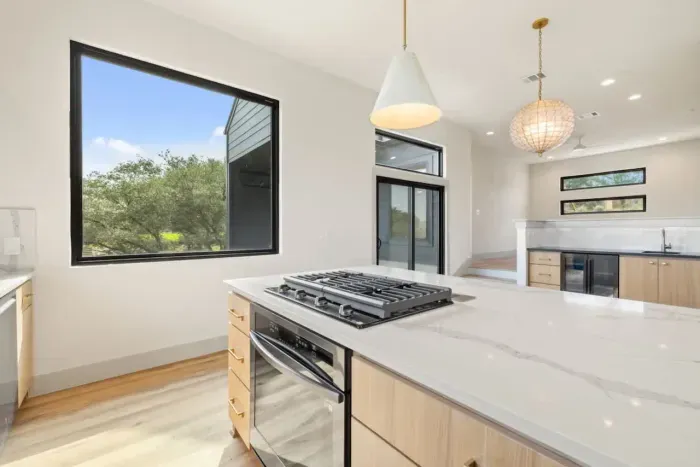 Kitchen with top-of-the-line appliances and island seating.