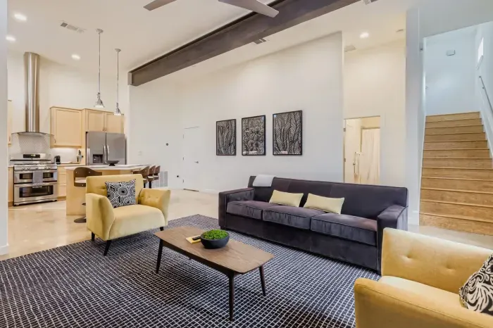 Open-concept layout that flows seamlessly from living room to kitchen.