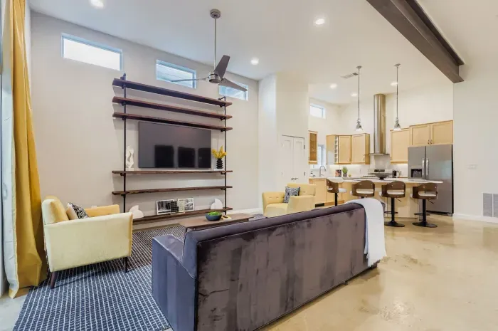 Spacious living area with smart TV and comfortable seating for the whole group.