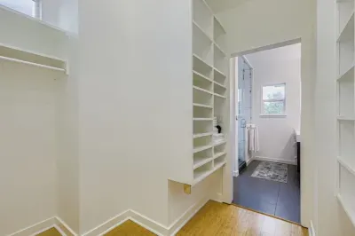 Walk-in closet with plenty of storage for longer stays.