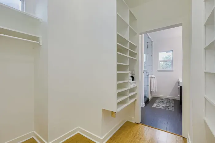 Walk-in closet with plenty of storage for longer stays.
