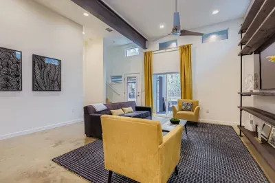 Inviting lounge area with chic décor and warm natural light.
