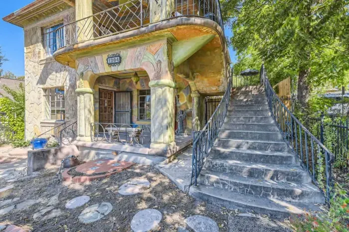 The hand carved stone on the exterior highlights the artistic vision the builder had when constructing the home!