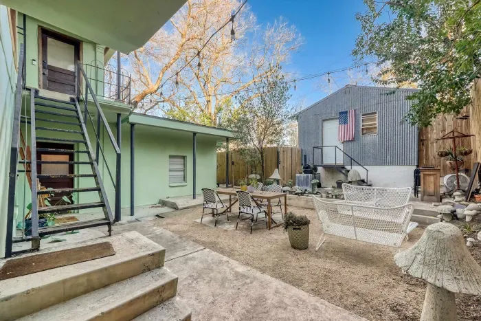Private courtyard with outdoor seating.