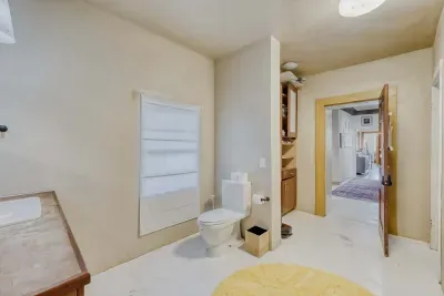 Convenient half bathroom on main level.