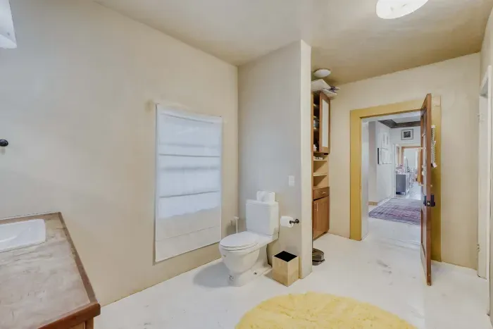 Convenient half bathroom on main level.