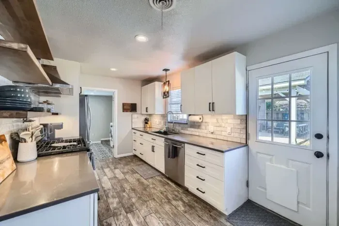 Enjoy family meals or casual snacks in this well-appointed kitchen with plenty of natural light.