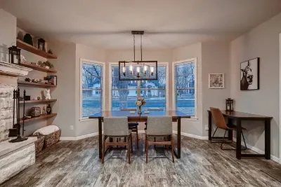Open-concept living room with seamless flow to the kitchen and dining areas.