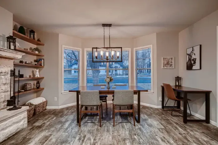 Open-concept living room with seamless flow to the kitchen and dining areas.