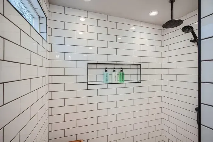 Remodeled primary bathroom with rainshower