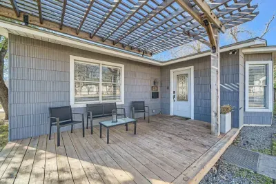 Inviting facade with a cozy front porch and stylish details.