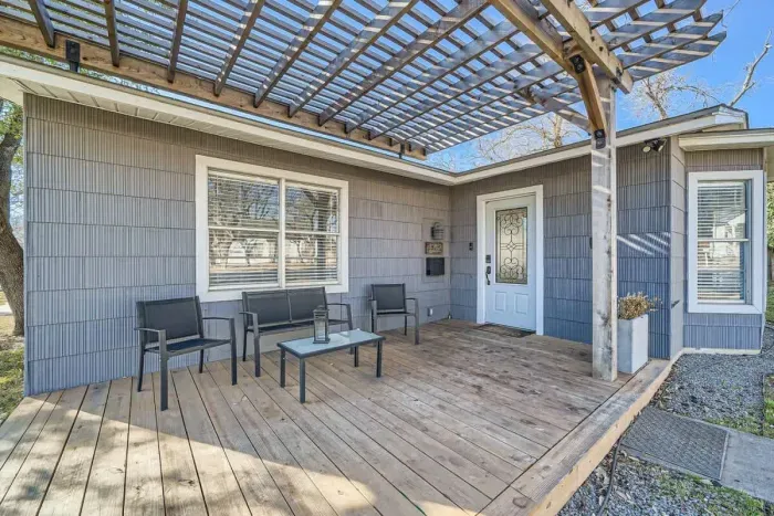 Inviting facade with a cozy front porch and stylish details.