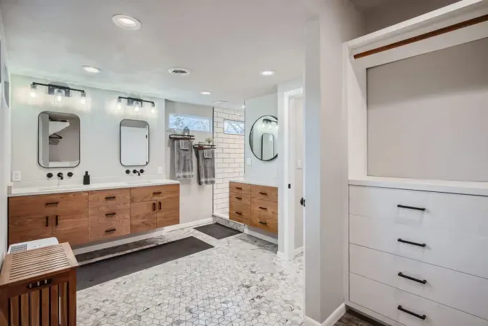 Unwind in our spacious bathroom with modern amenities and a touch of luxury