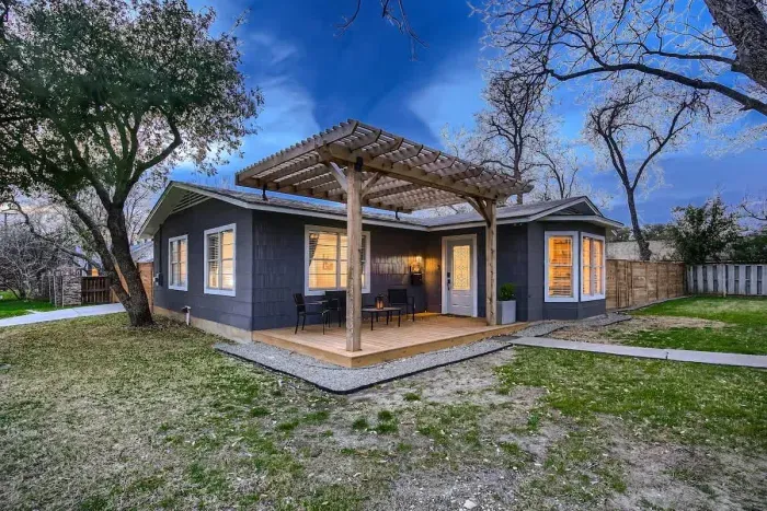 Bright and sunny patio with plenty of space for lounging or enjoying a meal outdoors.