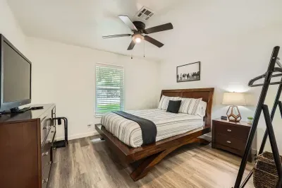 Spacious bedroom with elegant touches and relaxing atmosphere.