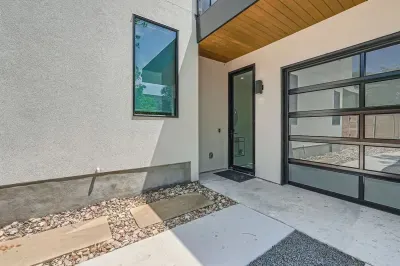 5. Bright and airy exterior with a mix of modern materials and natural finishes.