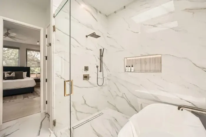 Unwind in our spacious bathroom with modern amenities and a touch of luxury.