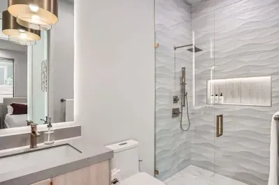 Simple yet elegant bathroom with a minimalist design and all the essentials.