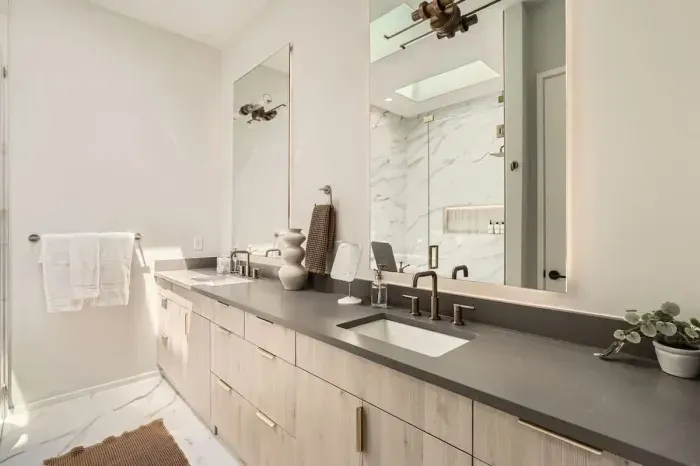 Unwind in our spacious bathroom with modern amenities and a touch of luxury