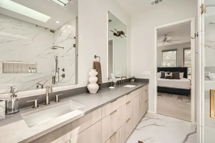 Bright and airy bathroom with plenty of counter space.