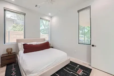 Bright and chic bedroom with plenty of natural light.