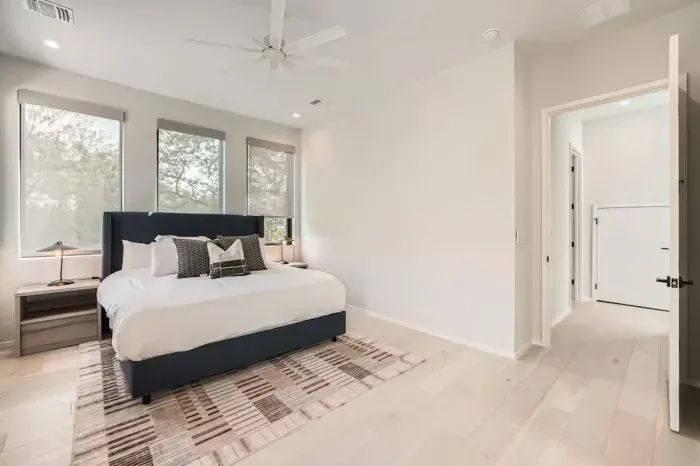 A king-size bed, high-end linens, and elegant decor make this room a luxurious retreat for relaxation.