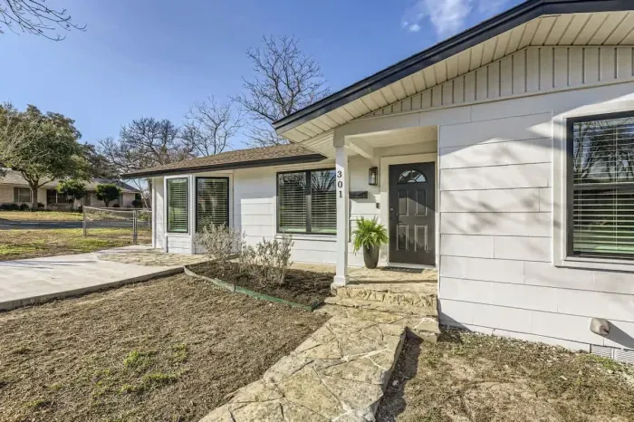Sun-drenched backyard with a stunning view for ultimate relaxation.