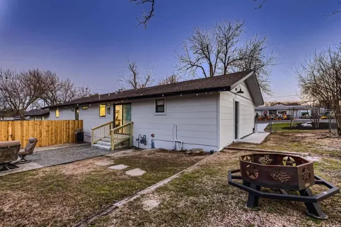 Spacious and beautifully landscaped backyard, ideal for gatherings or quiet relaxation.