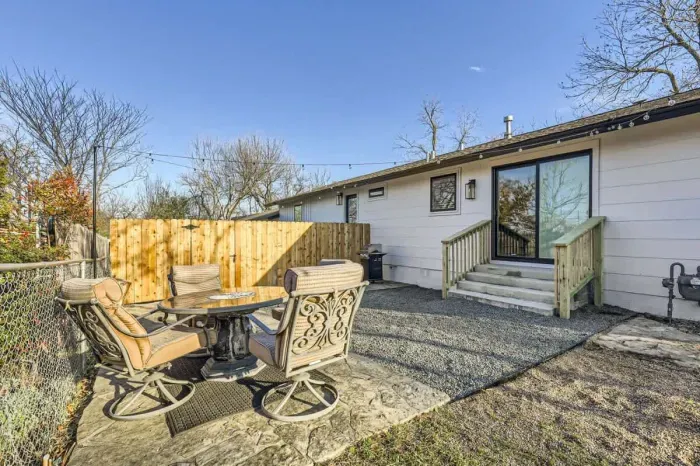 Sun-drenched backyard with plenty of seating and a stunning view for ultimate relaxation.