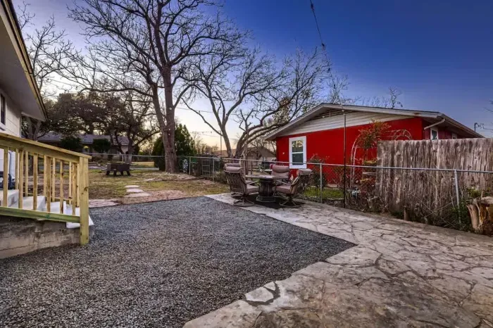 Tranquil backyard escape with cozy seating for relaxation and serenity.