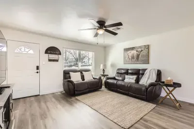 Spacious living area with comfortable couches, perfect for gathering with friends and family.