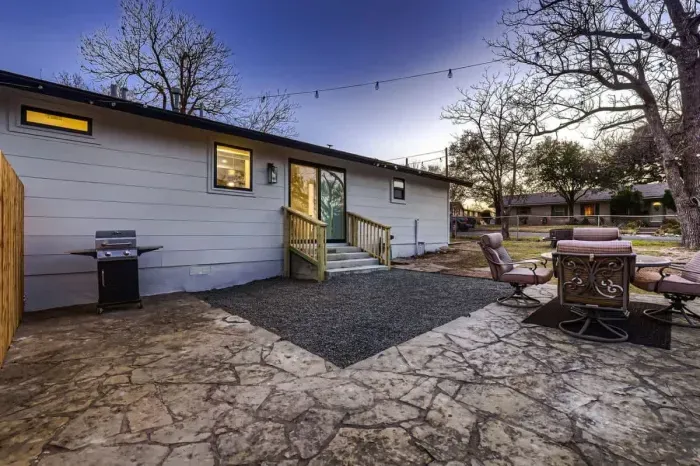 Spacious and beautifully landscaped backyard, ideal for gatherings or quiet relaxation.