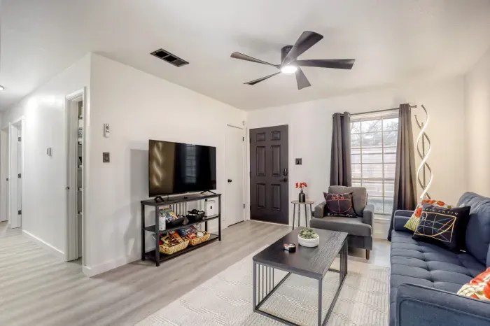 Smart TV setup with fast WiFi and convenient in-home laundry, designed for both short stays and longer visits