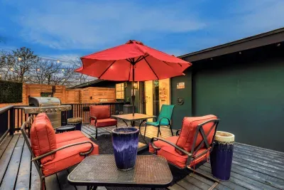 Inviting outdoor space with soft lighting, comfortable seating, and a laid-back atmosphere for evening gatherings