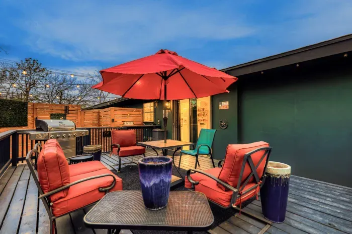 Inviting outdoor space with soft lighting, comfortable seating, and a laid-back atmosphere for evening gatherings