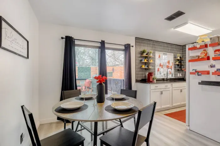 Bright dining nook with direct patio access, ideal for morning coffee or evening meals outside