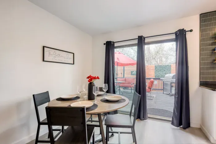 Dining area with seating for four, natural light, and easy access to the backyard patio for indoor-outdoor meals
