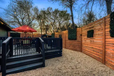 Spacious outdoor area with deck access and warm lighting, perfect for enjoying peaceful Georgetown nights