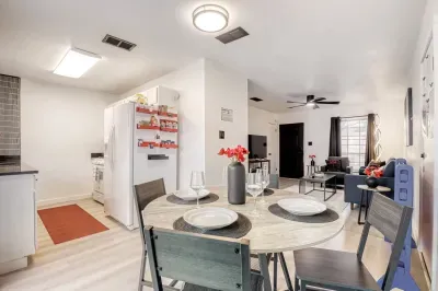Open layout dining and kitchen area designed for easy flow between cooking, dining, and relaxing