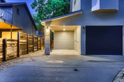 1. Modern home with sleek lines, large windows, and a minimalist design.