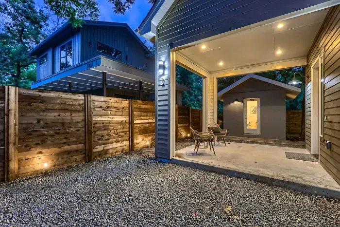 Private backyard with tall fences, providing a quiet and secure space for relaxation.