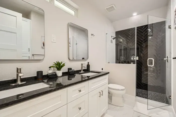 Unwind in our spacious bathroom with modern amenities and a touch of luxury.