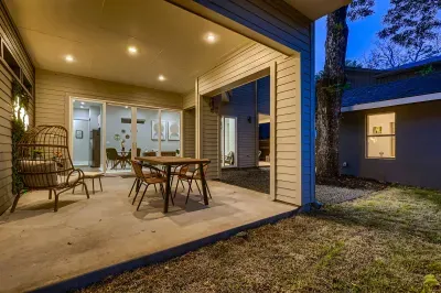 6. Sun-drenched backyard with plenty of seating for ultimate relaxation.