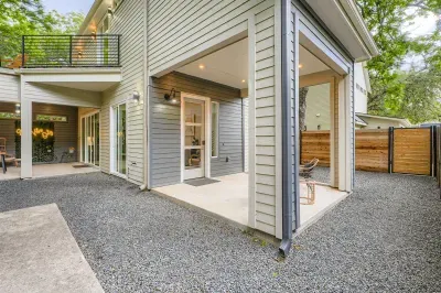 Bright and airy exterior with a mix of modern materials and natural finishes.