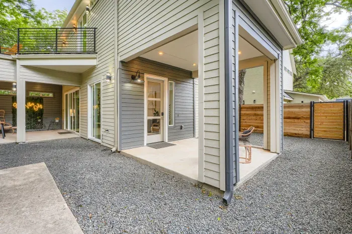 Bright and airy exterior with a mix of modern materials and natural finishes.