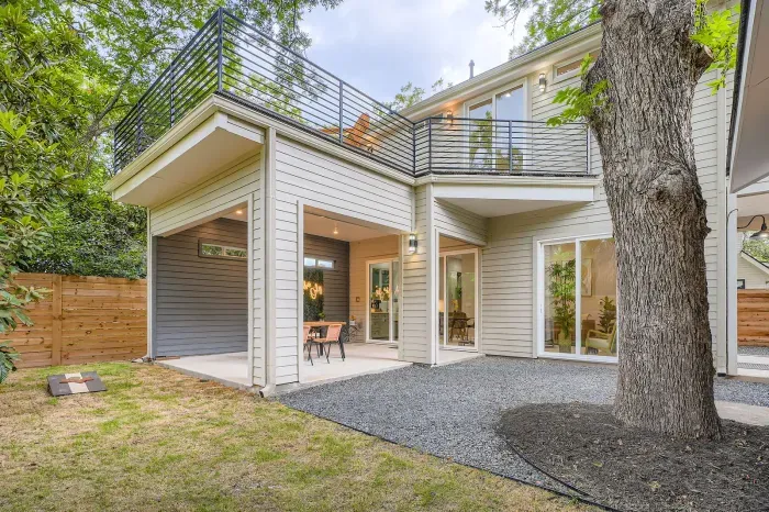 Family-friendly backyard with room to play, plenty of green space, and outdoor seating.